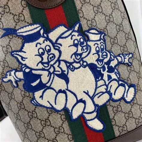 gucci trois petit cochon
